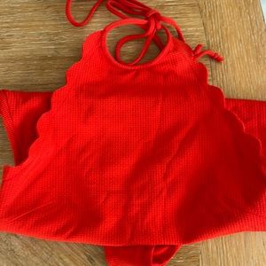No fading red one piece MarySia swimsuit . Scalloped edges.